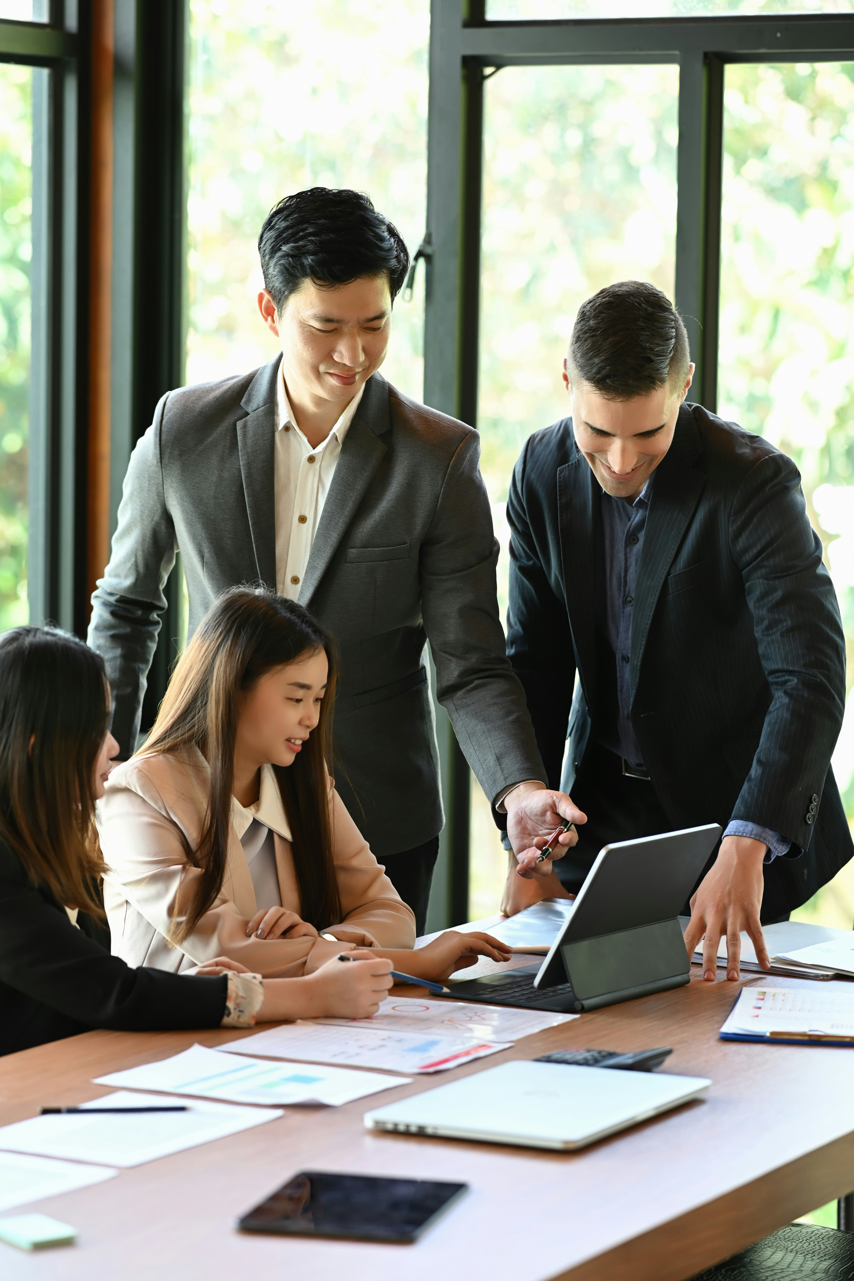 Consultants collaborating at a table